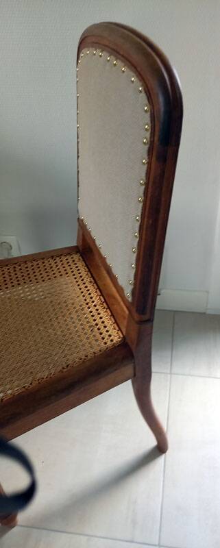 Solid oak art deco chair with cane and fabric.
