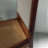 Solid oak art deco chair with cane and fabric.