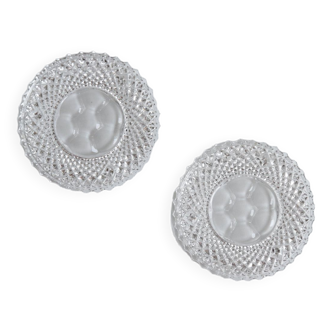 Pair of crystal bottle undersides