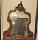 Grand miroir à glace biseauté de style rocaille rococo