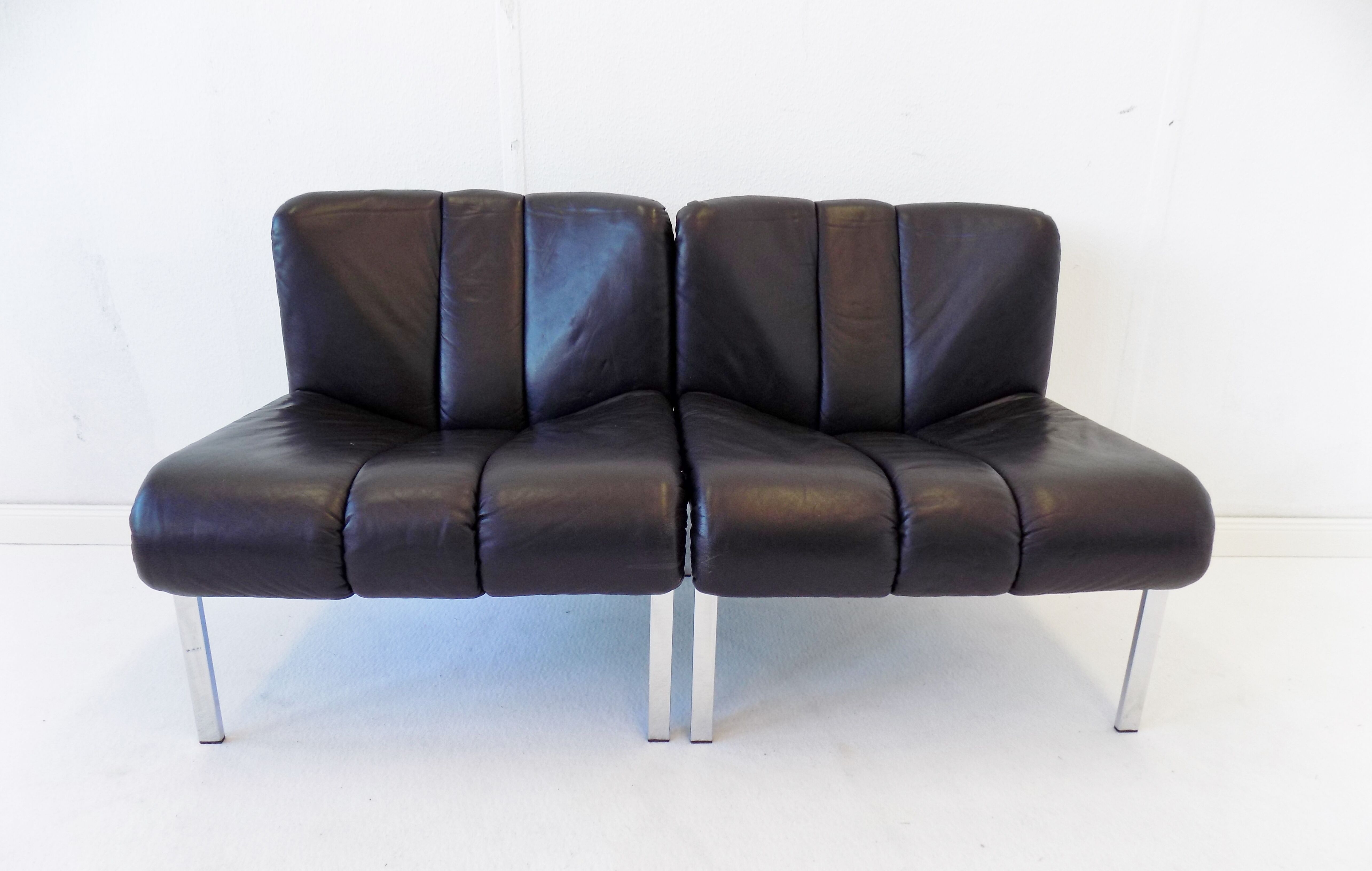 Girsberger Eurochair set of 2 black leather lounge chairs