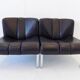 Girsberger Eurochair set of 2 black leather lounge chairs