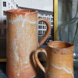 Duo of vintage glazed stoneware potter's pitchers