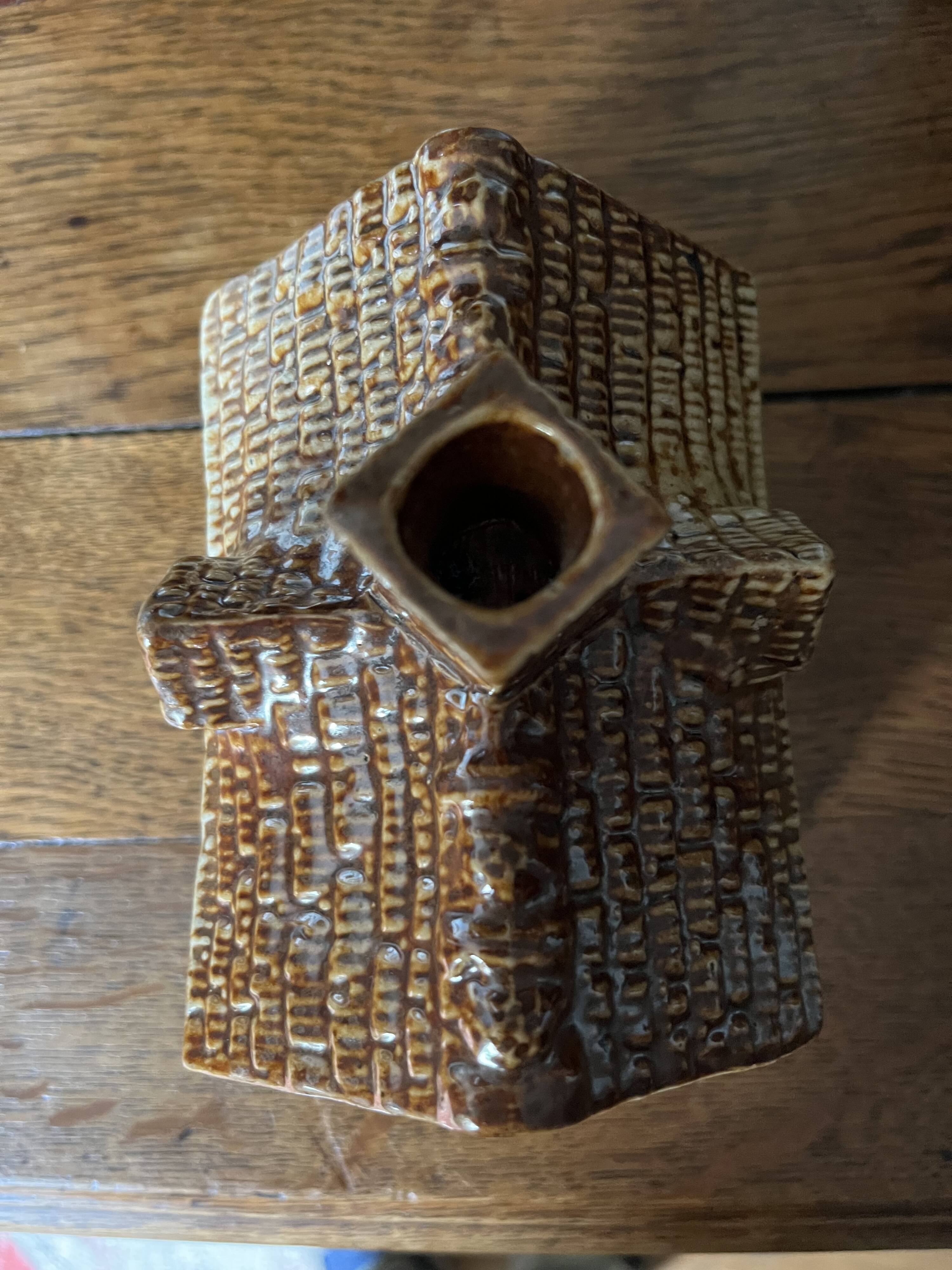 Brown salt-glazed stoneware tobacco pot with candle holder, 1840/1880