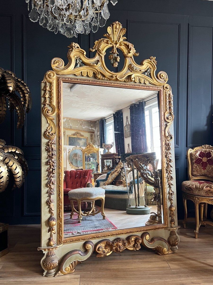 Italian mirror from the Napoleon III period in painted and gilded wood
