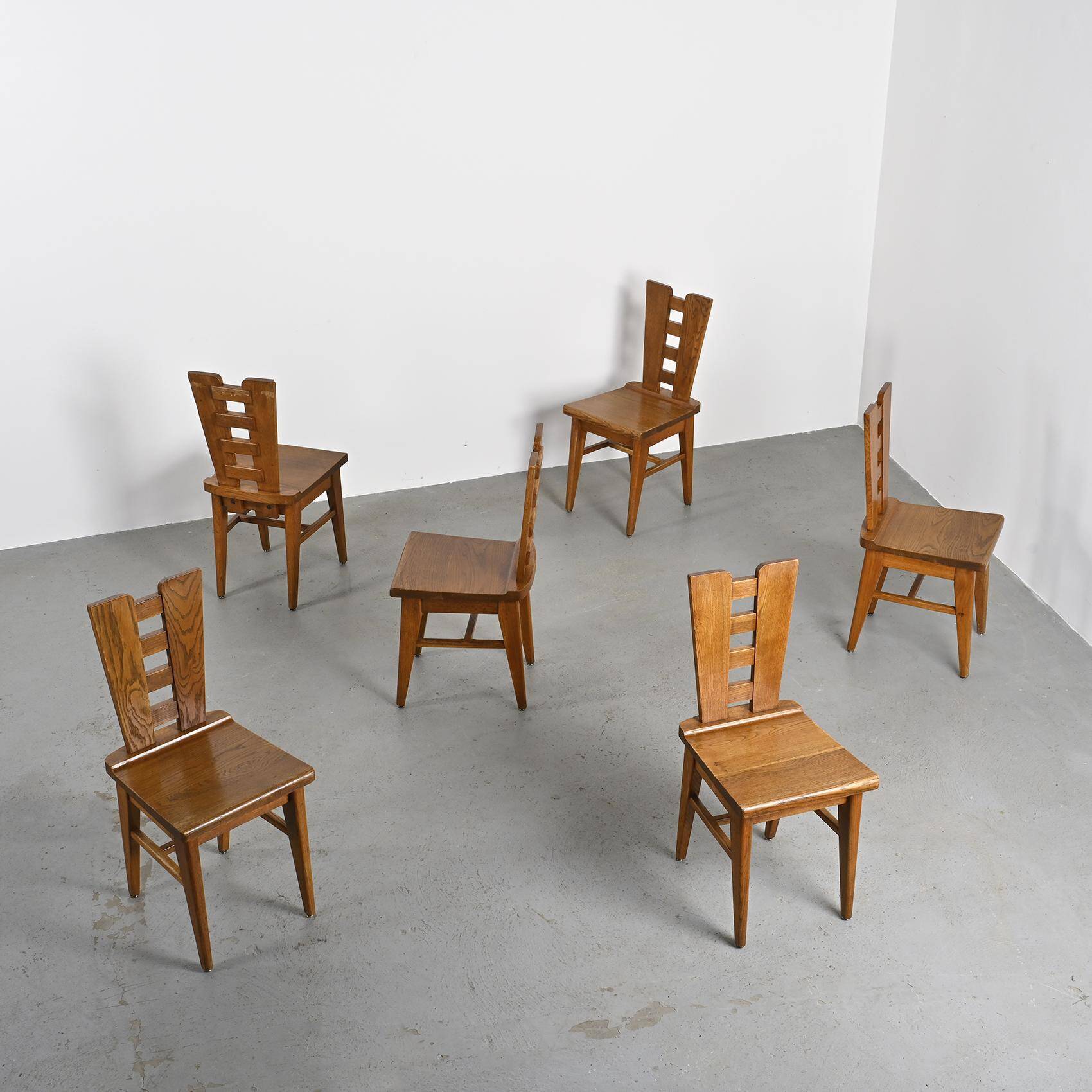Set of six oak chairs by Henry Jacques Le Même, France circa 1940