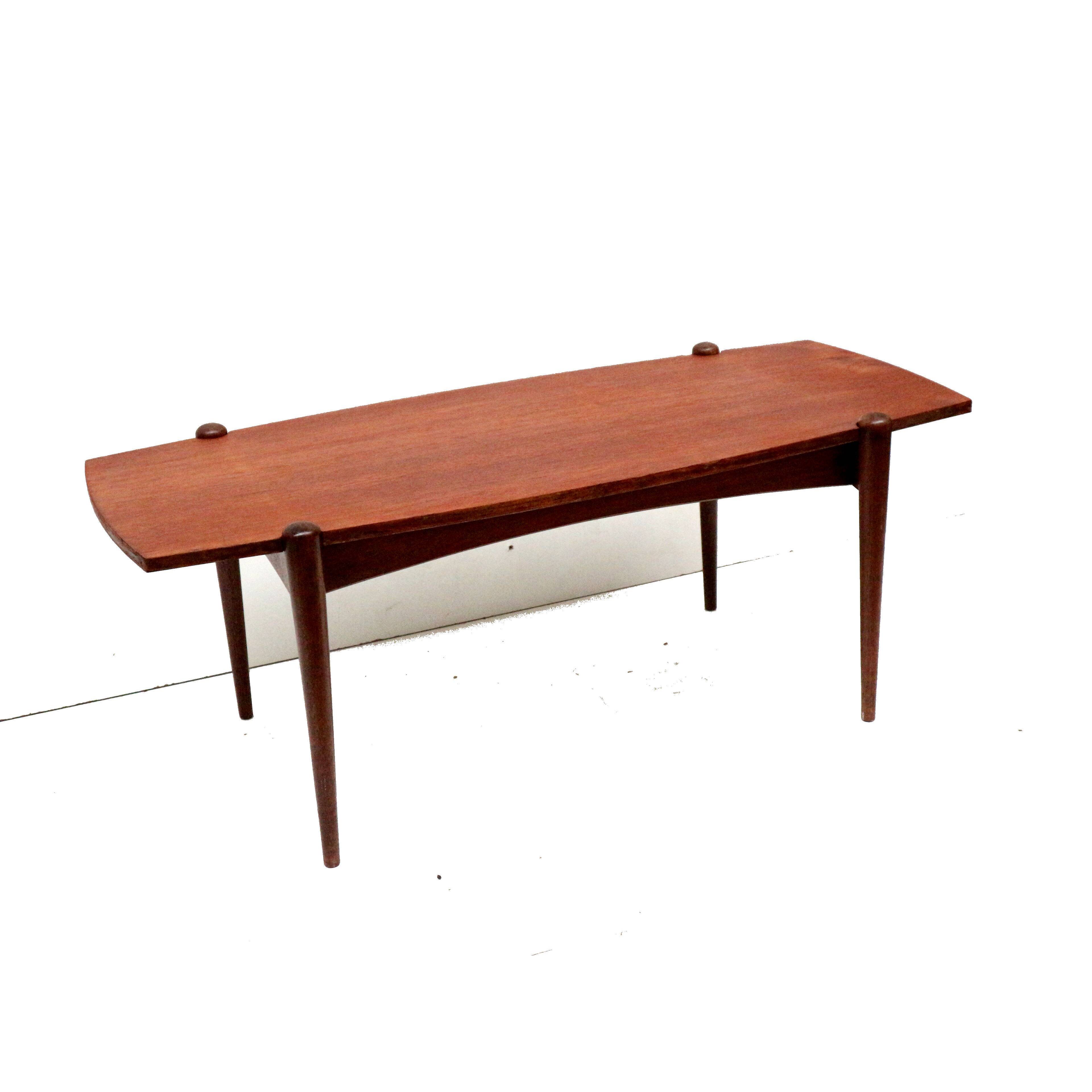 Vintage coffee table with reversible teak and formica top from the 60s