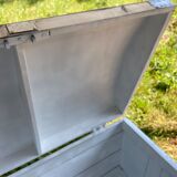 Raw wooden chest with a secret drawer