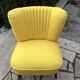 Yellow cocktail chair in solid beech, 1960s, with fluted backrest and tapered legs.