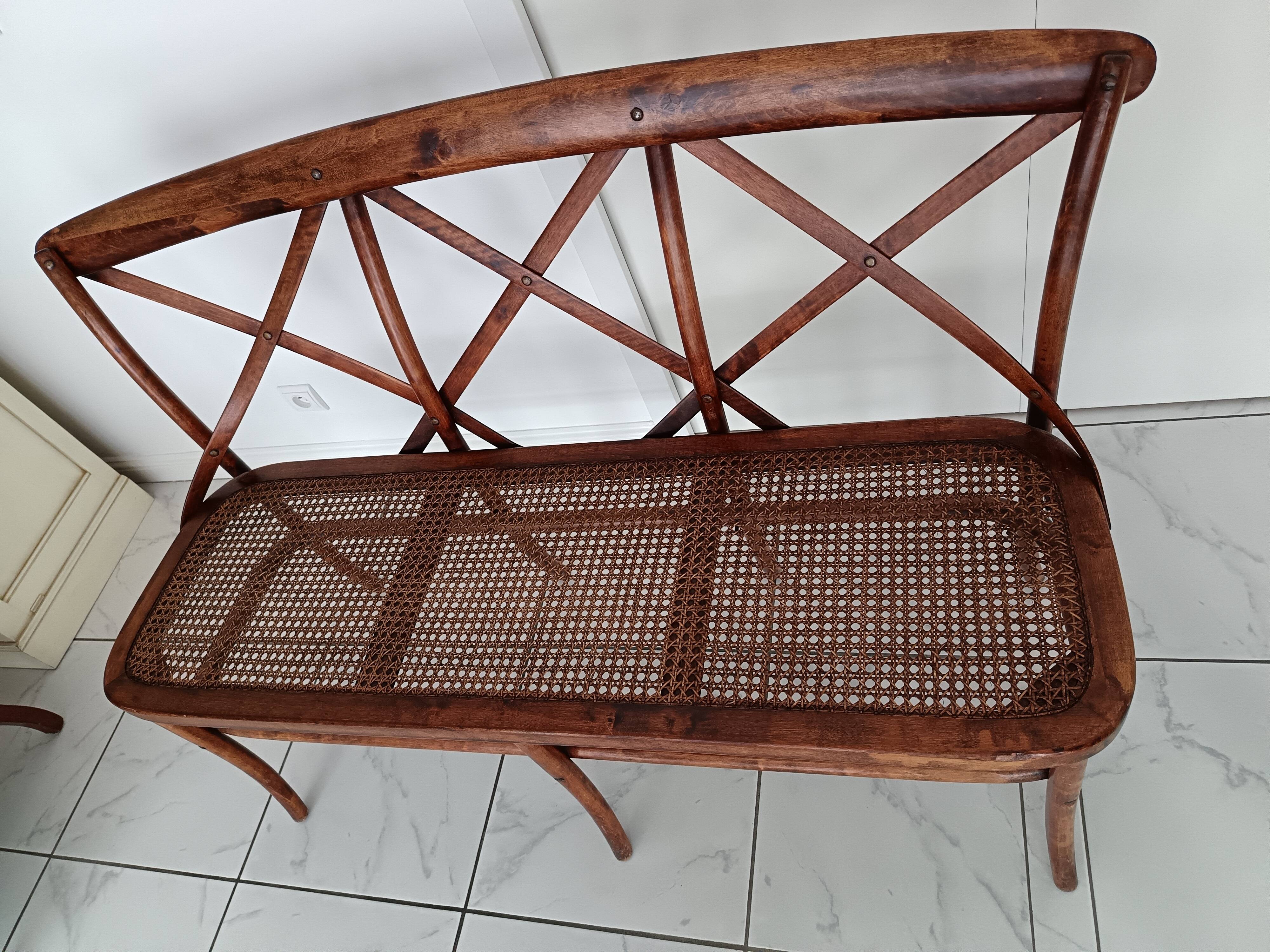 CURVED WOOD AND CANE BENCH