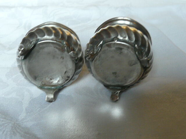 Pair of silver pepper shaker punch minerve