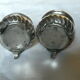 Pair of silver pepper shaker punch minerve