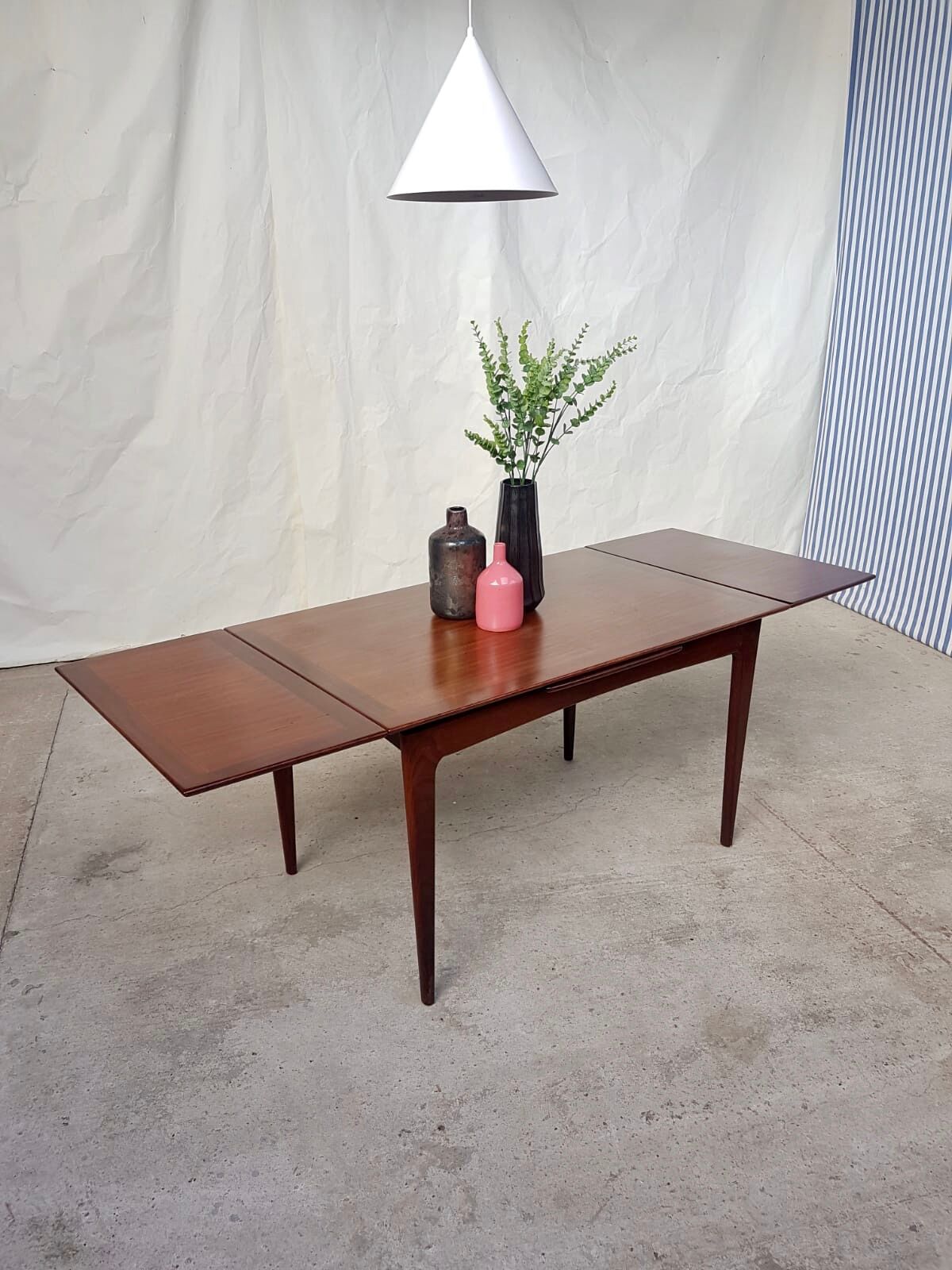 Teak extending dining table by Younger