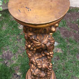 Wooden column in carved wood