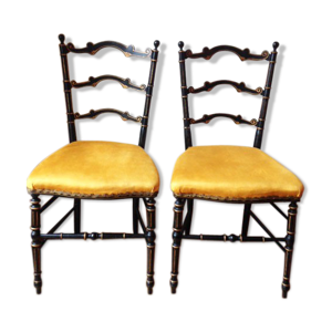 Paire de chaises noir et or