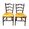 Paire de chaises noir et or