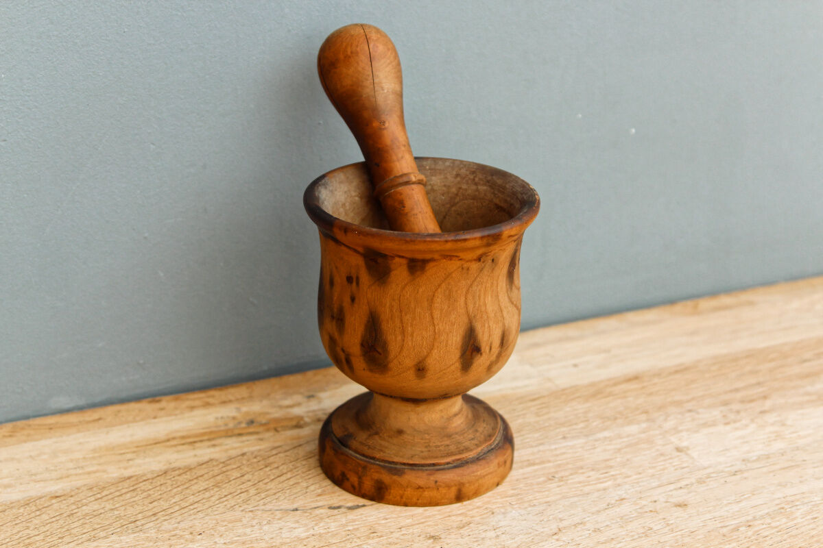 Ancient mortar and pestle, solid wood