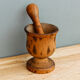 Ancient mortar and pestle, solid wood