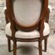 Louis XVI style children's armchair in carved walnut and beige antique upholstery