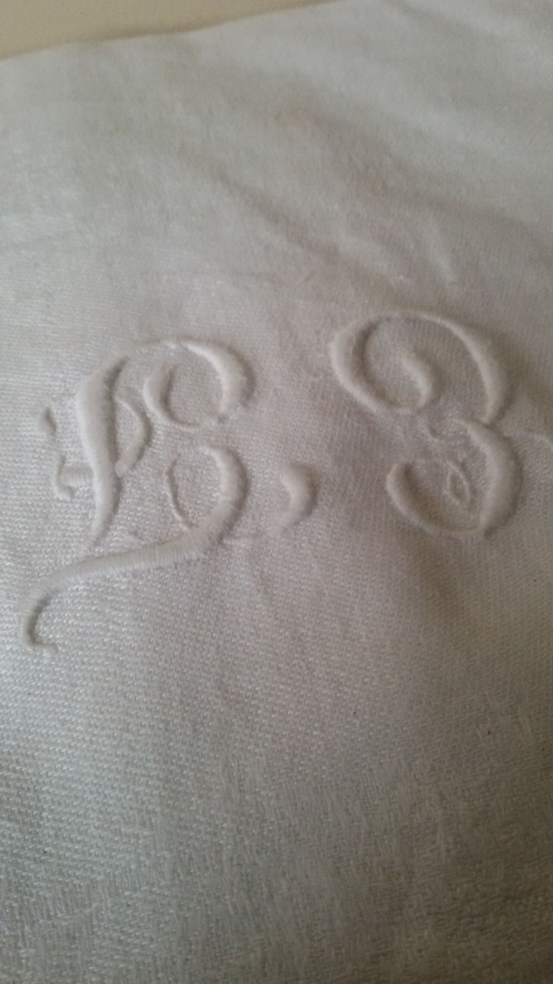 White monogrammed damask towels
