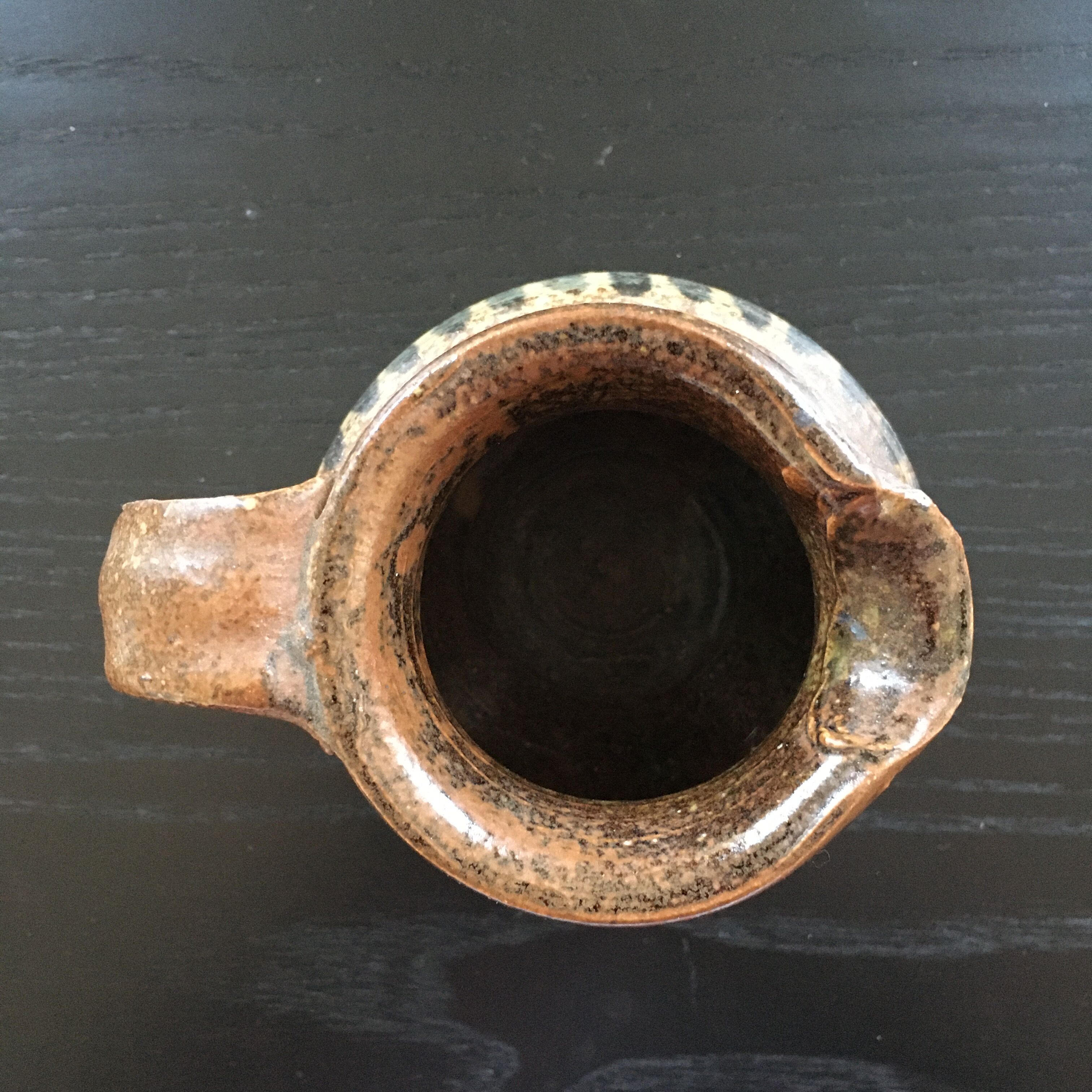 Stoneware pitcher with striped decoration