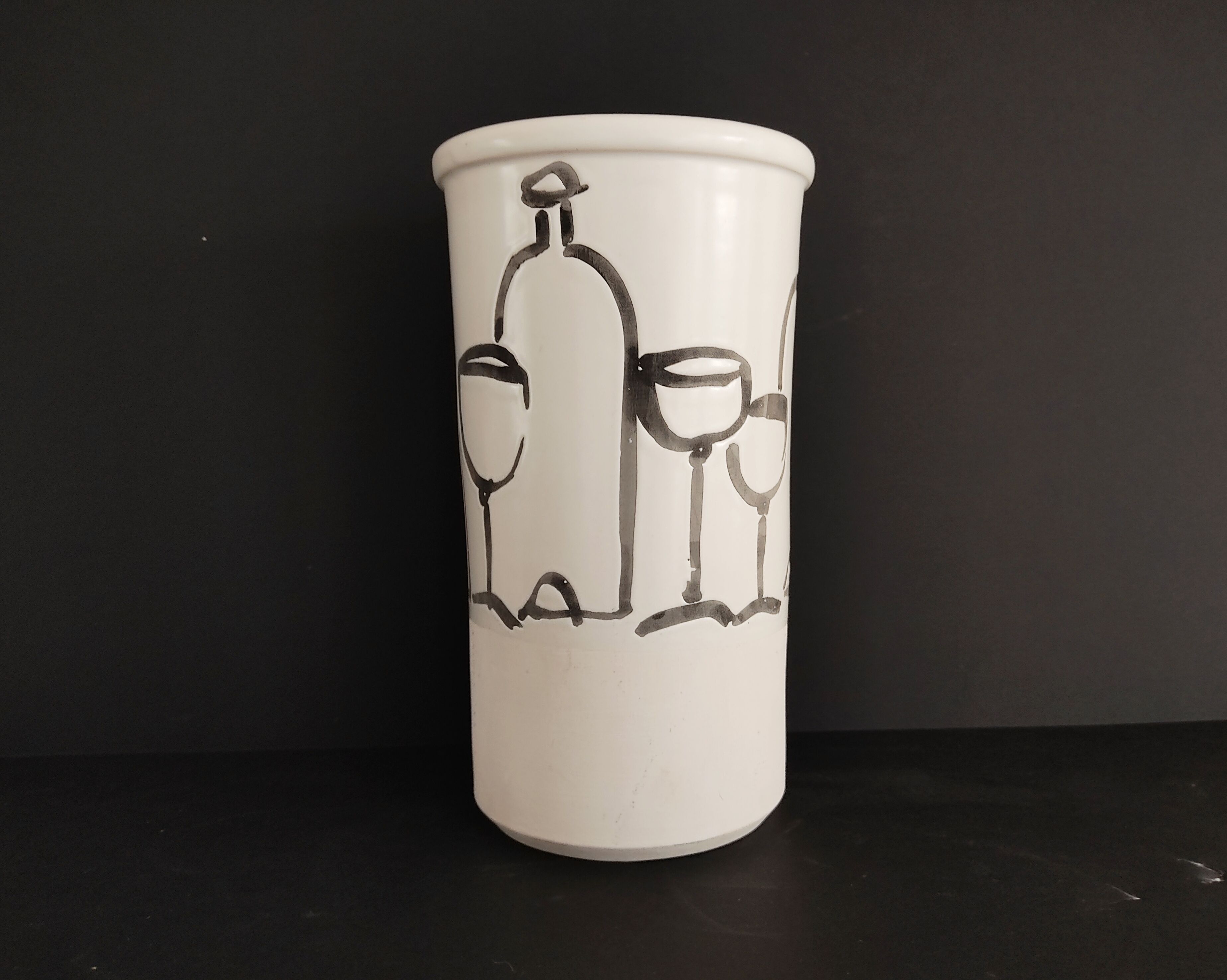 Vase decorated in hollows of bottles and glasses