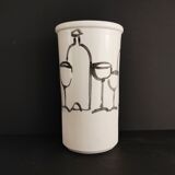 Vase decorated in hollows of bottles and glasses