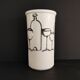 Vase with a relief design of bottles and glasses