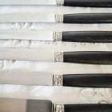 Silver and ebony cheese knives, stainless steel blade.