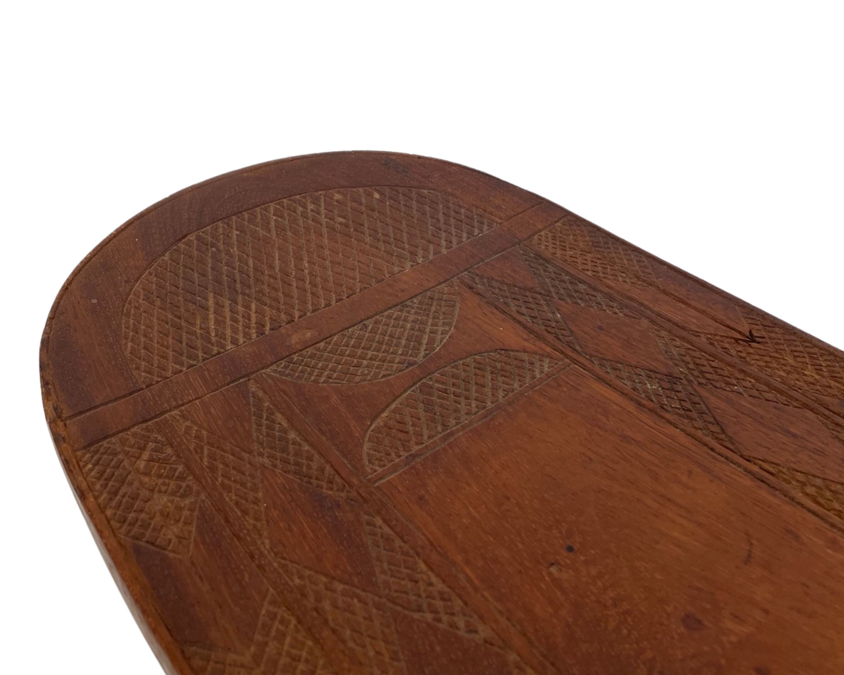 Vintage African hand-carved wooden Senufo stool bench design
