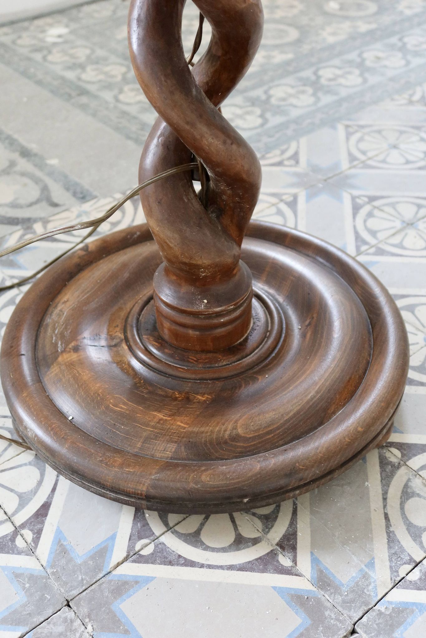 Vintage twisted turned wooden lamp base with shelf.