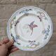 Vintage Longchamp plate handmade with bird and flower decoration, 25.5cm.