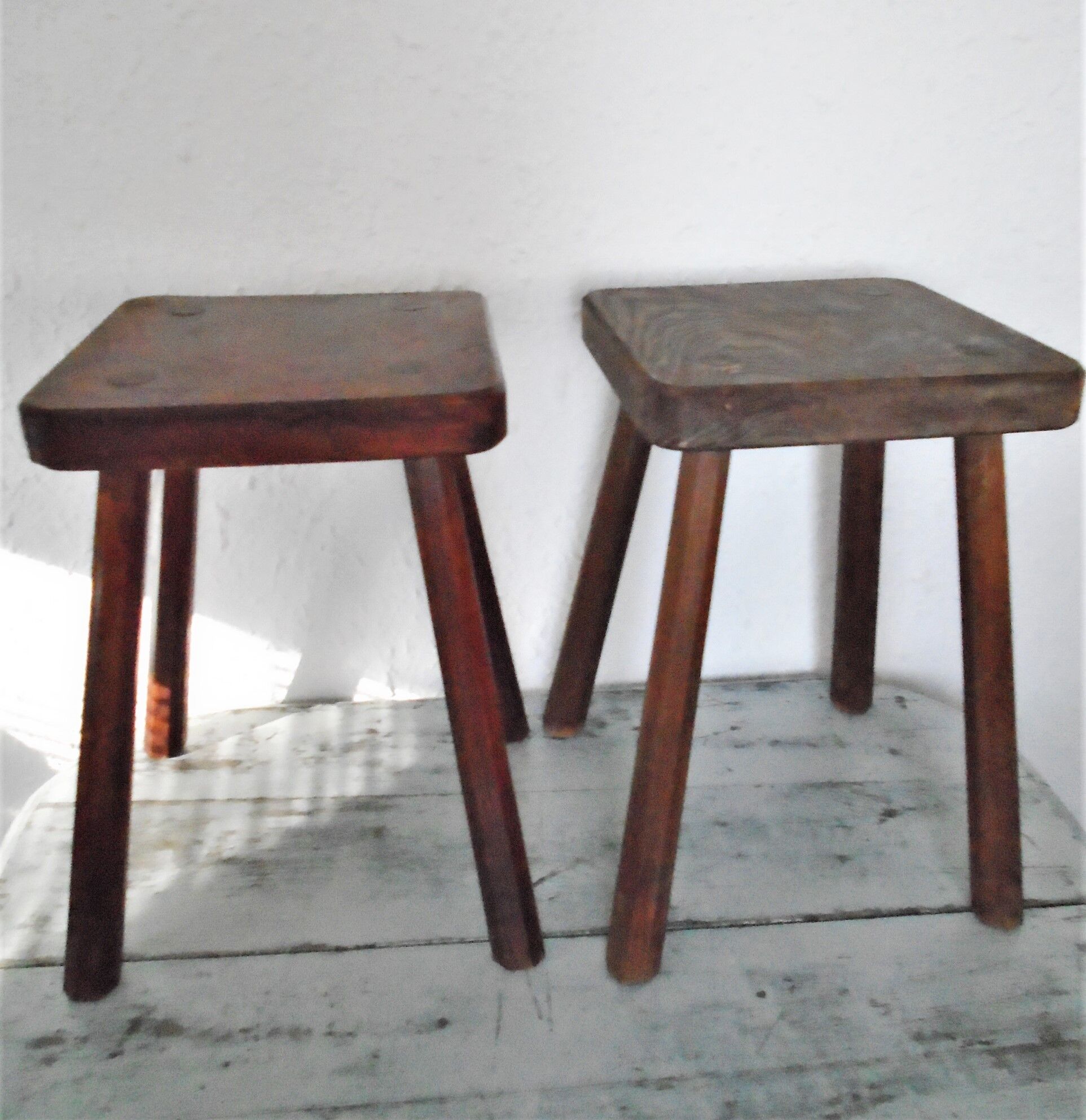 2 ancient brutalist wood stools