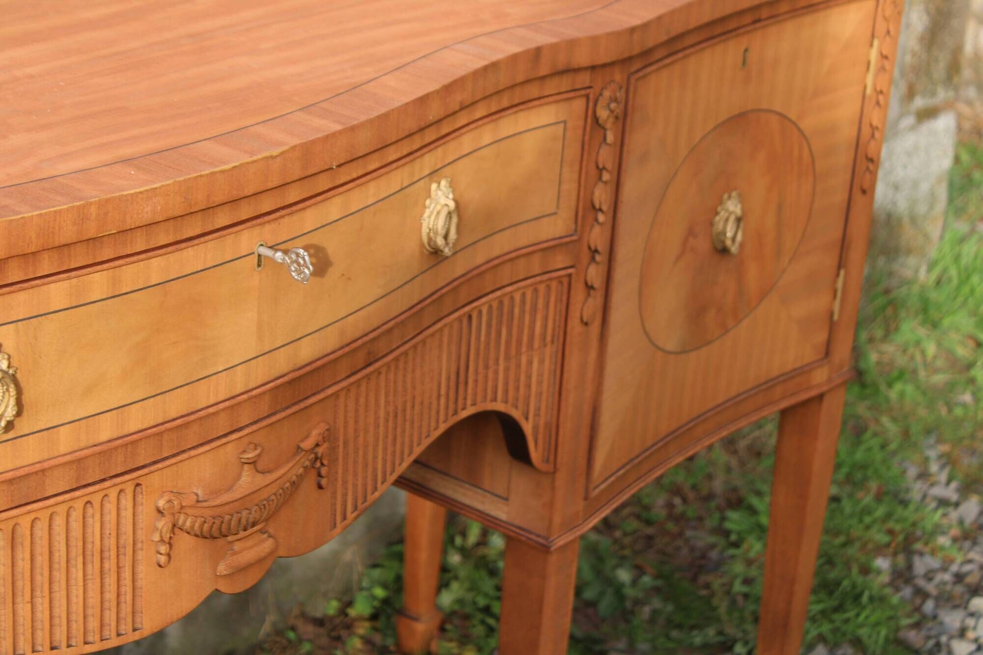 English-made enfilade in Louis XVI style with light wood veneers.