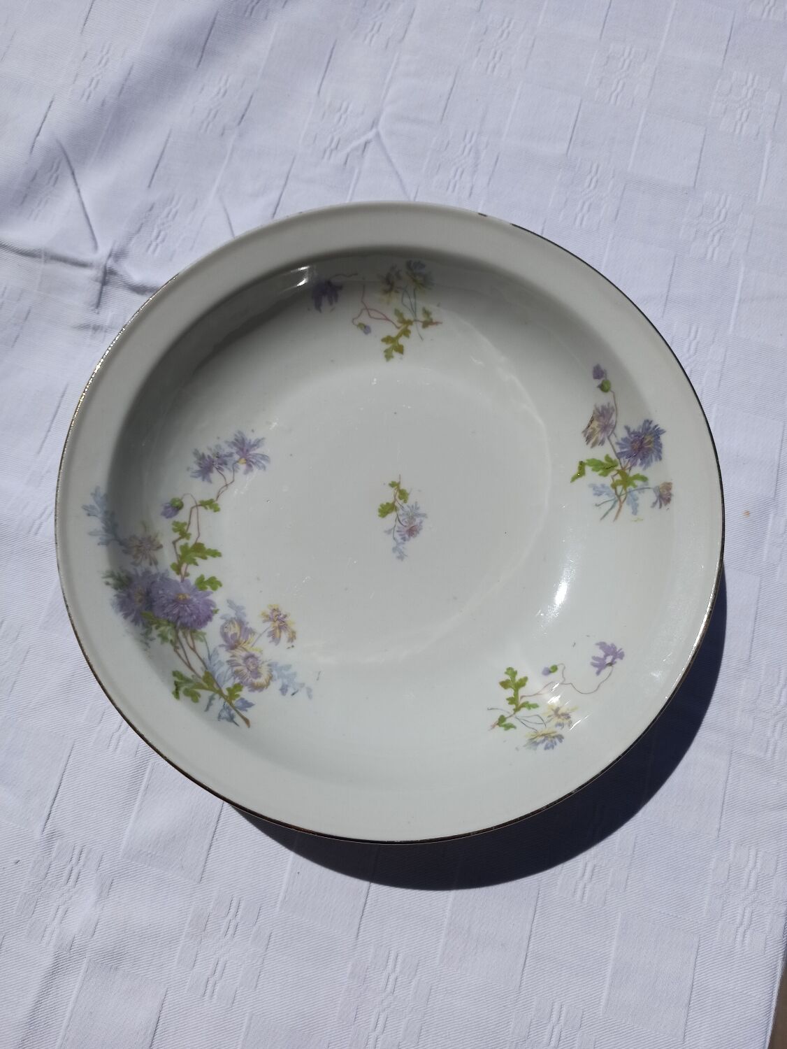 Plat rond en terre de fer cie française