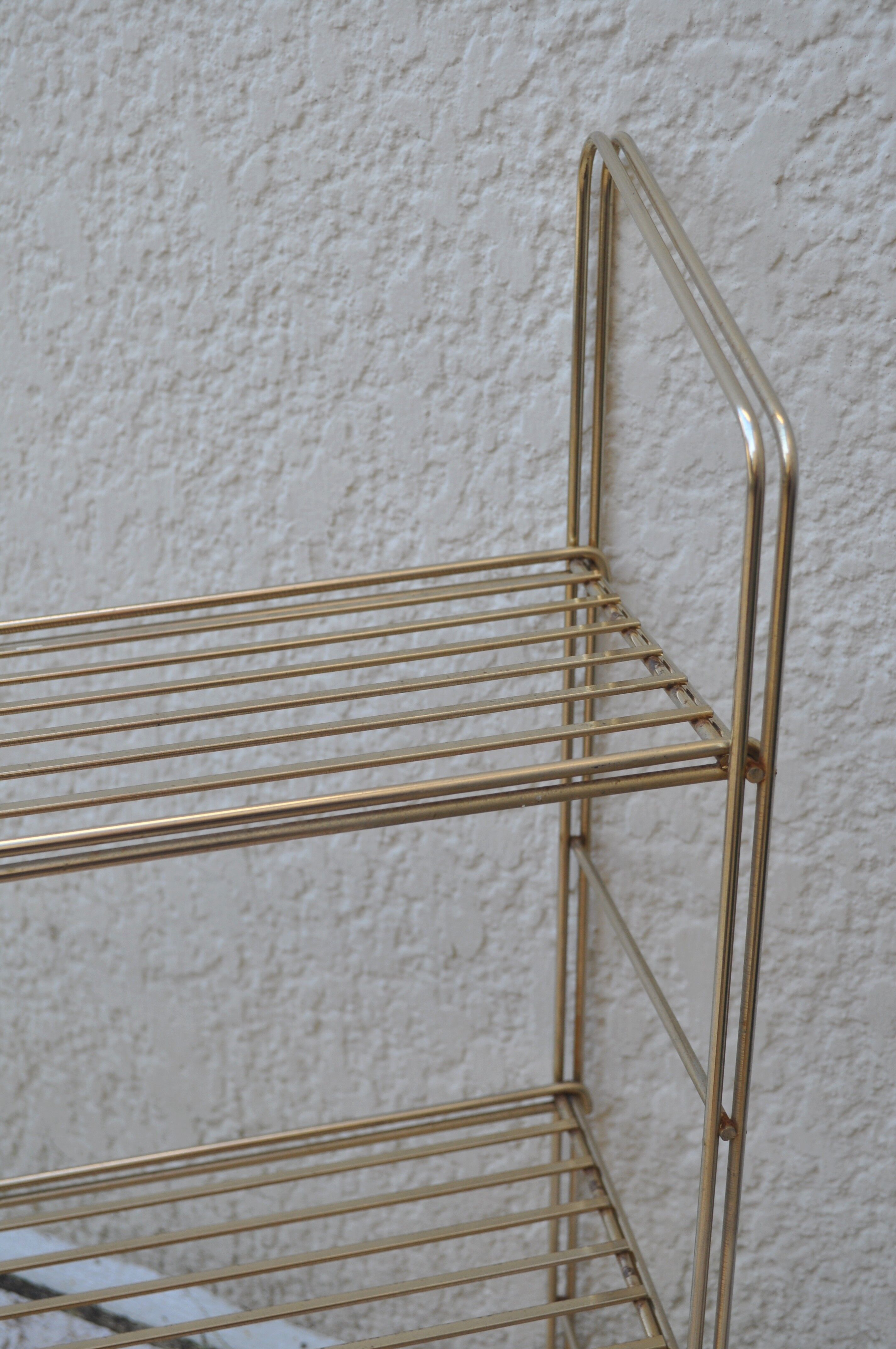Vintage all-metal string shelf