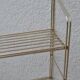 Vintage all-metal string shelf