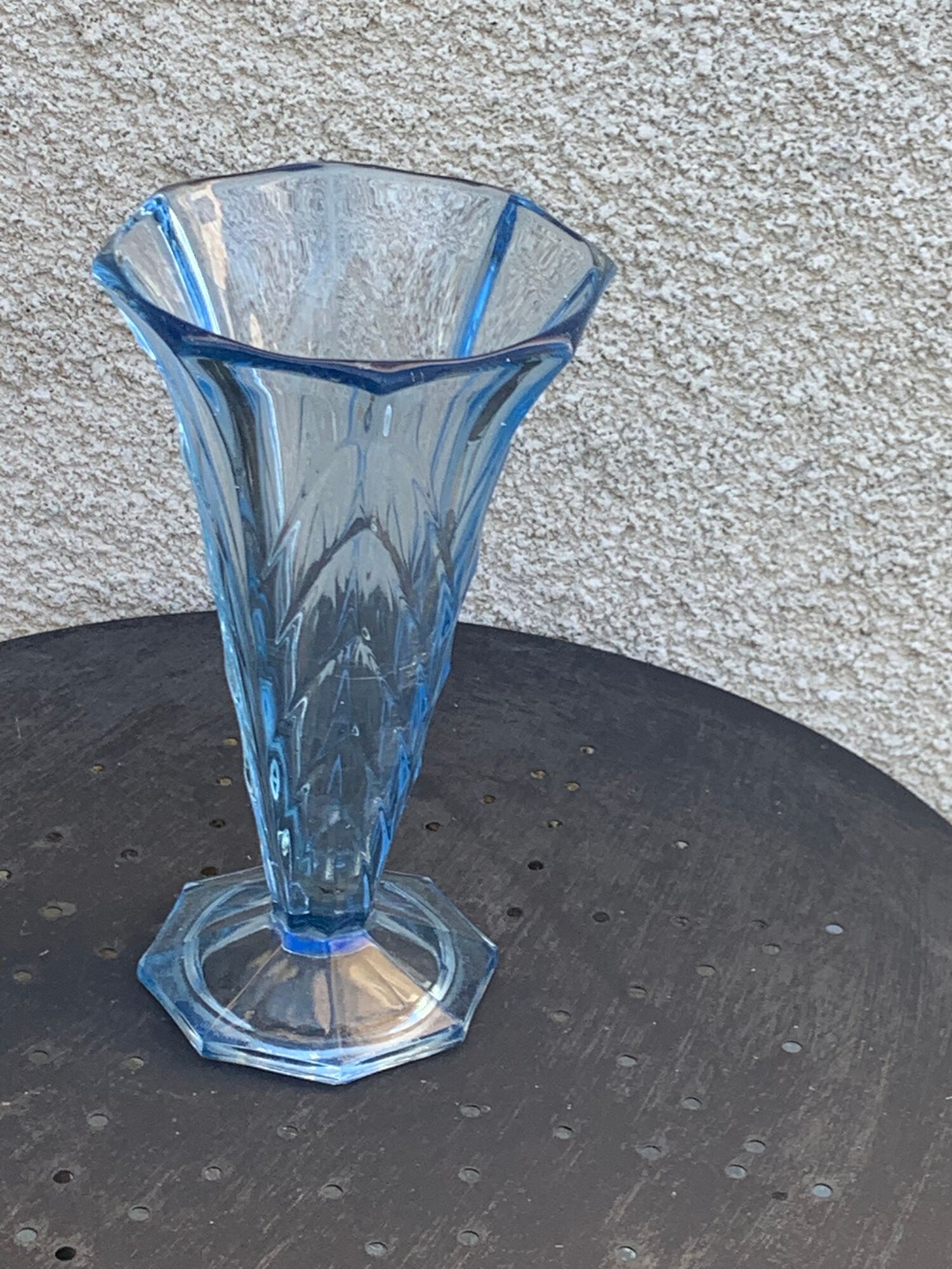 Blue molded glass vase in art deco relief