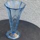 Blue molded glass vase in art deco relief