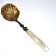 Empire sprinkling spoon in gilded silver vermeil and mother-of-pearl, 19th century.
