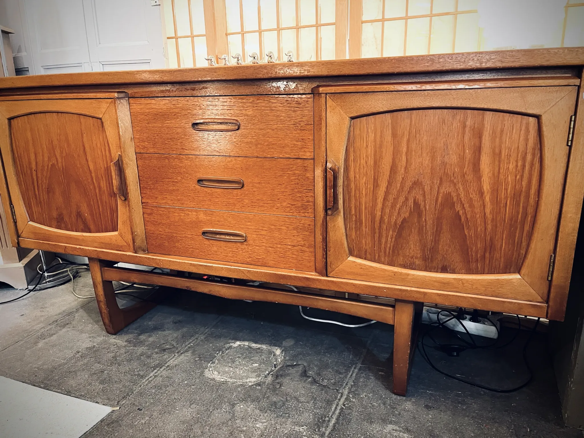 Classic British mid-century teak enfilade, circa 1960s.