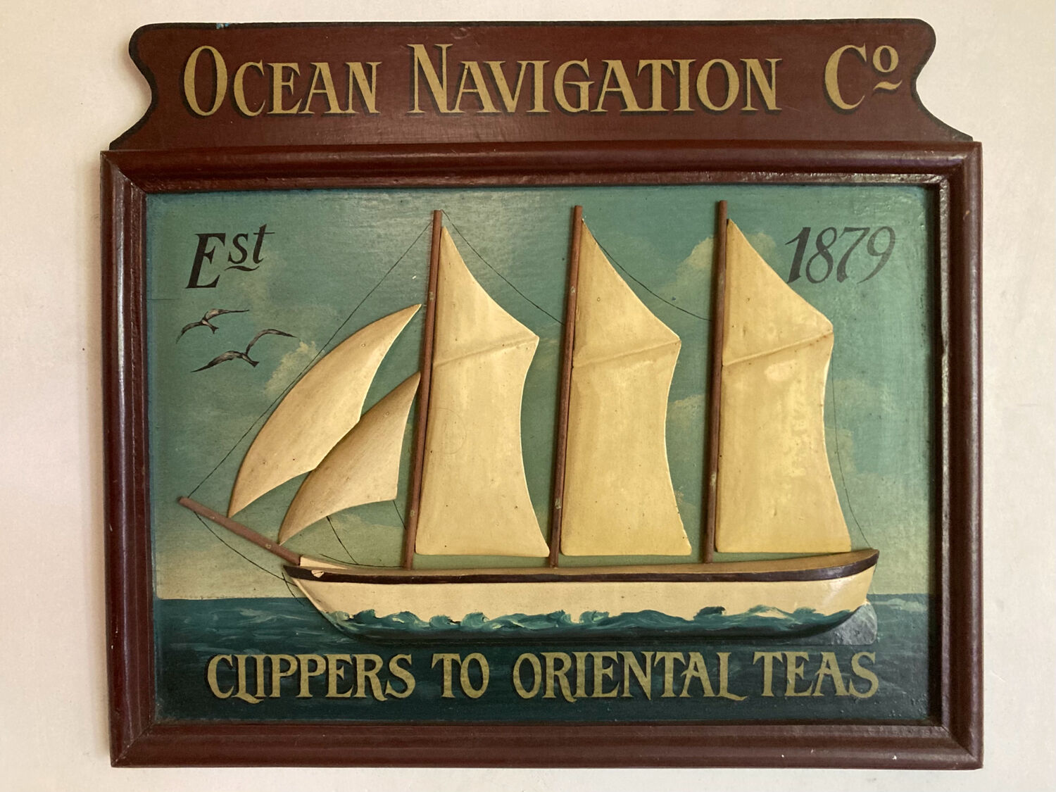 Tableau en bois peint bateau sculpté en relief : Ocean Navigation Co