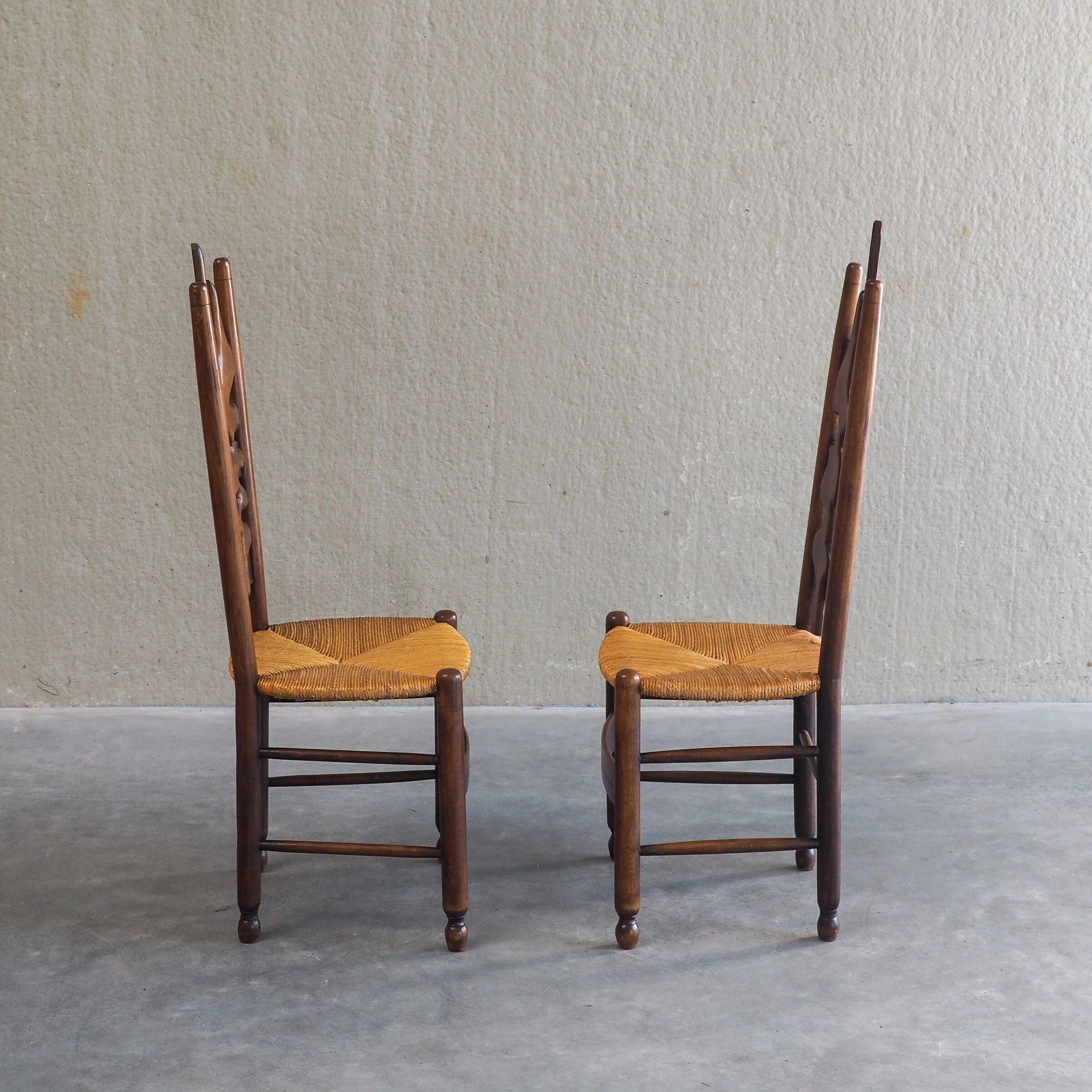 2 sculptural brutalist high-back chairs