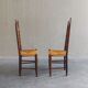 2 sculptural brutalist high-back chairs