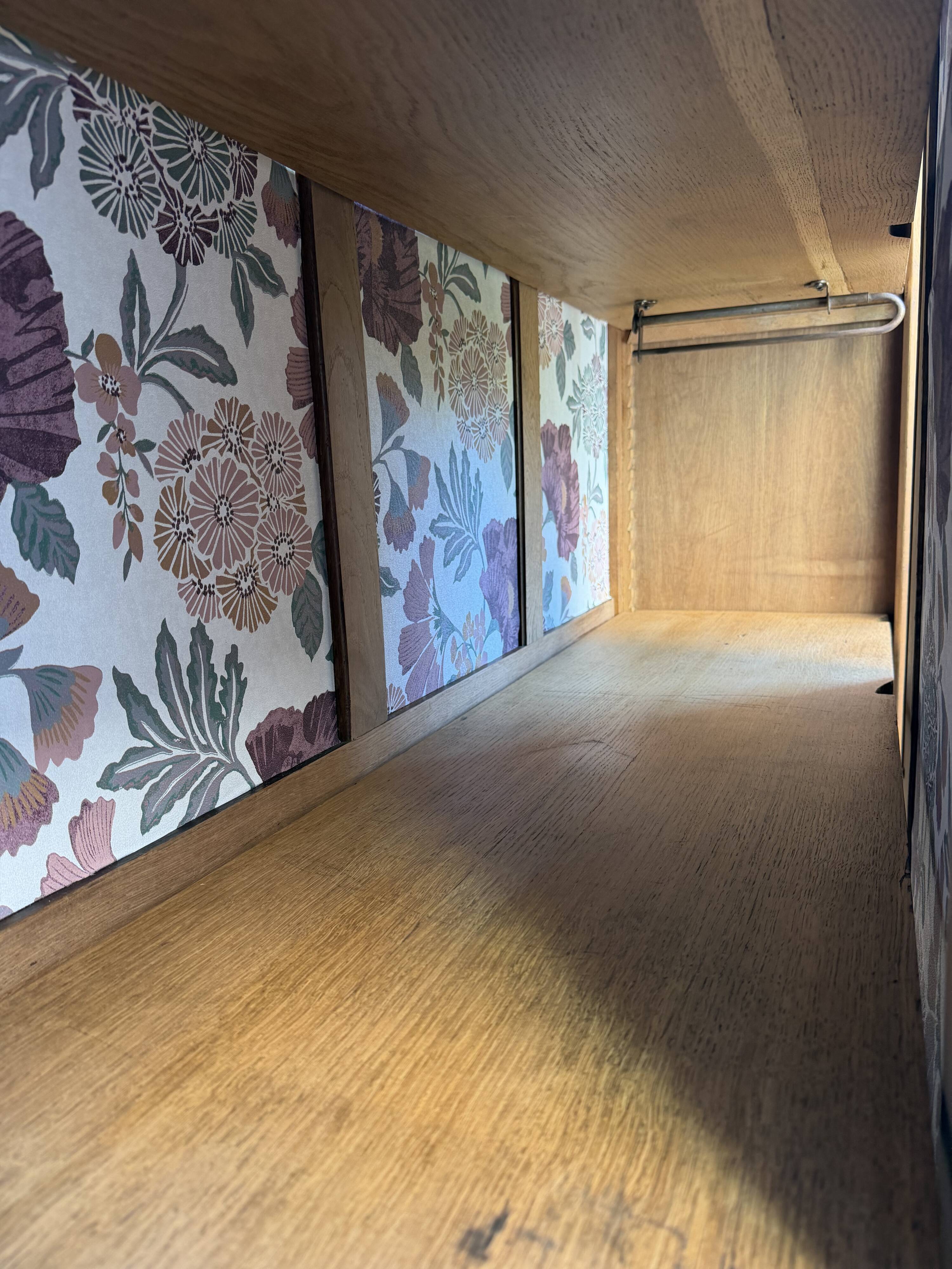 Art deco wardrobe in raw oak with bevelled mirror.
