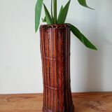 Japanese vase made of woven bamboo. Ikebana