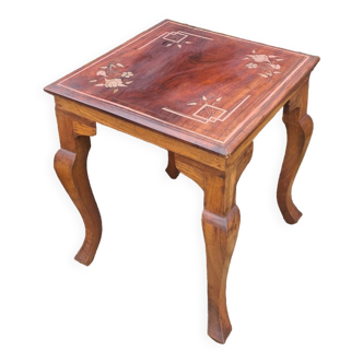 Coffee table in brass marquetry