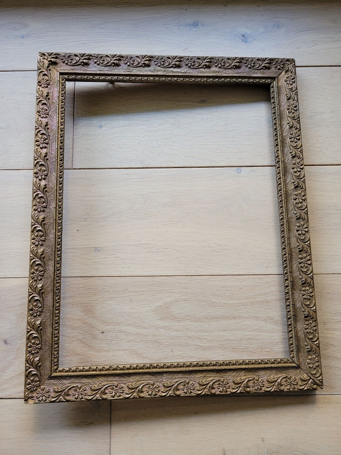 Gilded wooden frame floral moldings