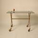 Table d’appoint en laiton et verre dans le style de Jacques Adnet