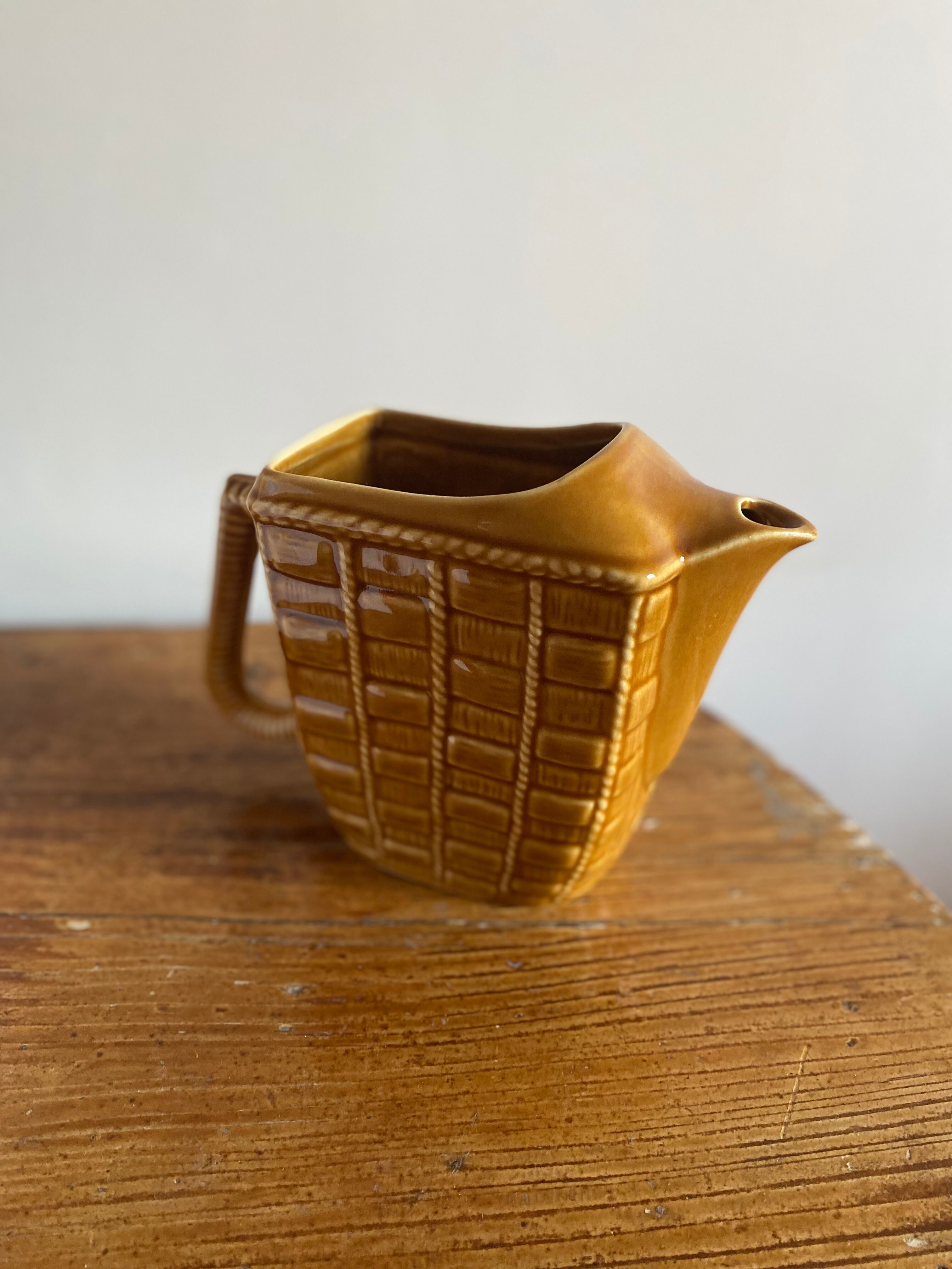 Glazed ceramic water pitcher
